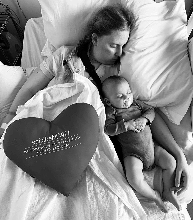 Kristy Novillo naps in the hospital with her son, Dominic, while recovering from surgery.  (Photo courtesy of Jorge Novillo)